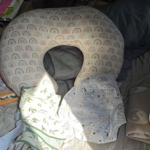 Barely used boppy pillow for babies. Coles with two extra covers.